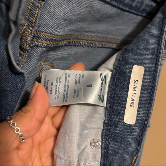 Seven7 Light Blue Slim Flare Jeans with Distressed Accents. - Picture 5 of 6